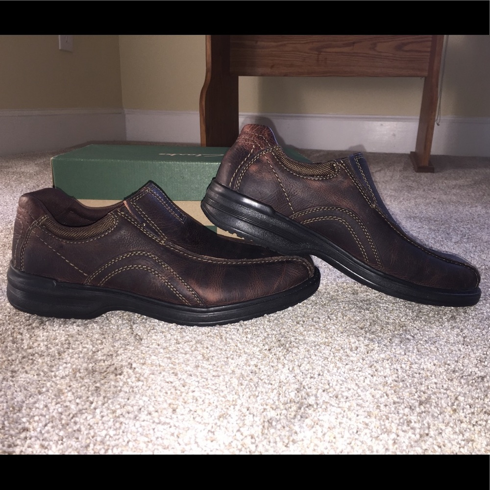 Brand new Clarks brown men's slip on shoes.